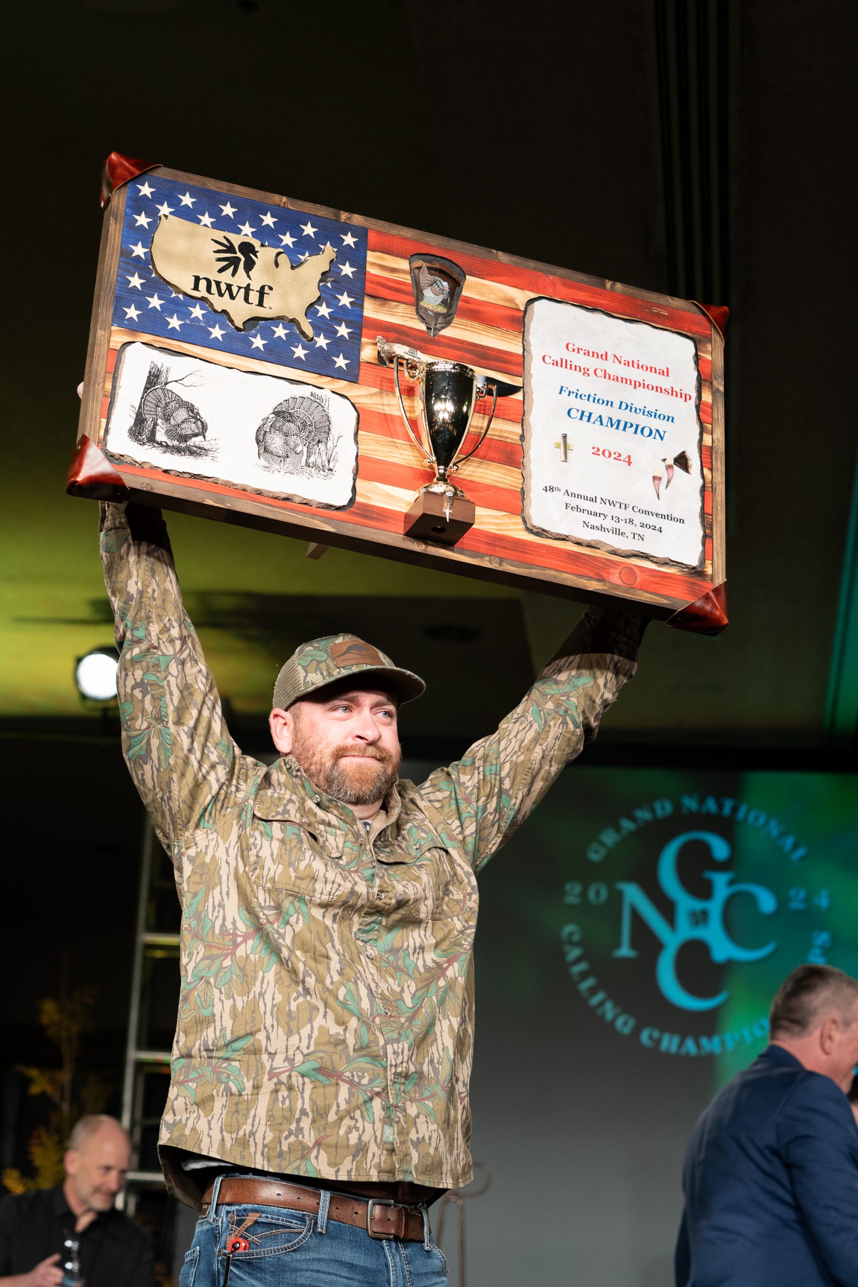 Dylan Bearden hold up his trophy after the GNCC.