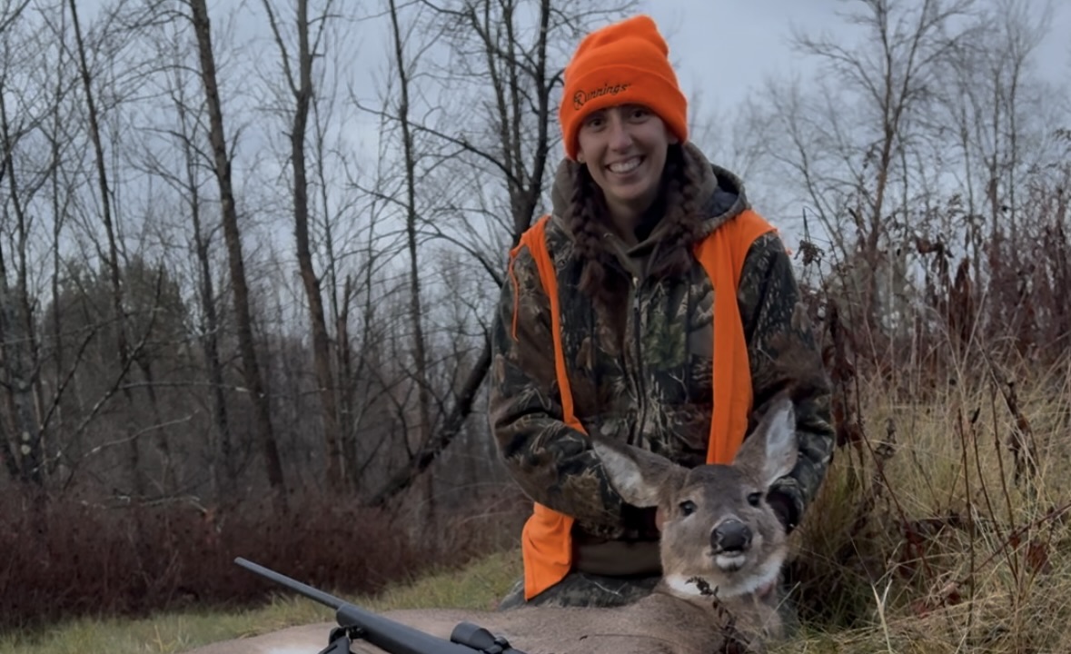 Madison Carr with her first doe.