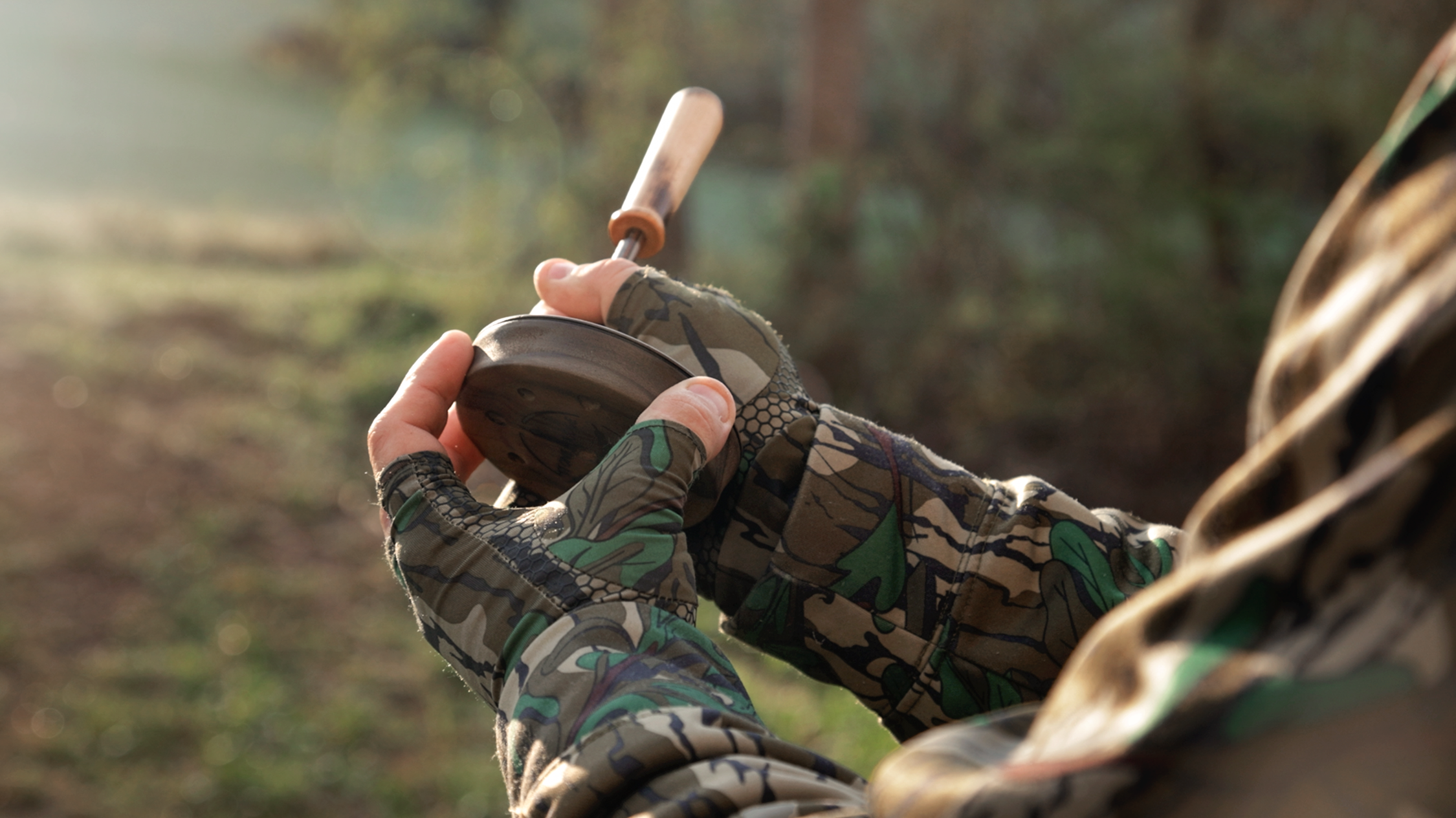 turkey hunter using a slate call