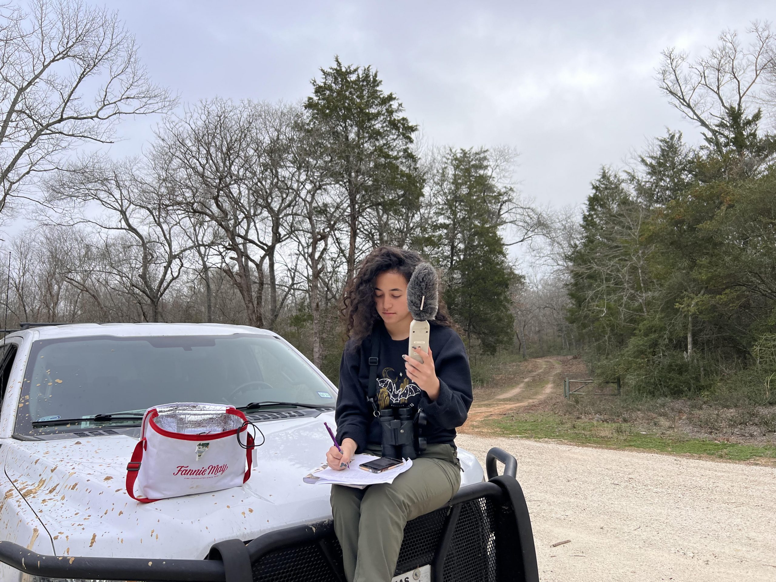 student researcher conducting a road survey of wild turkeys in Texas