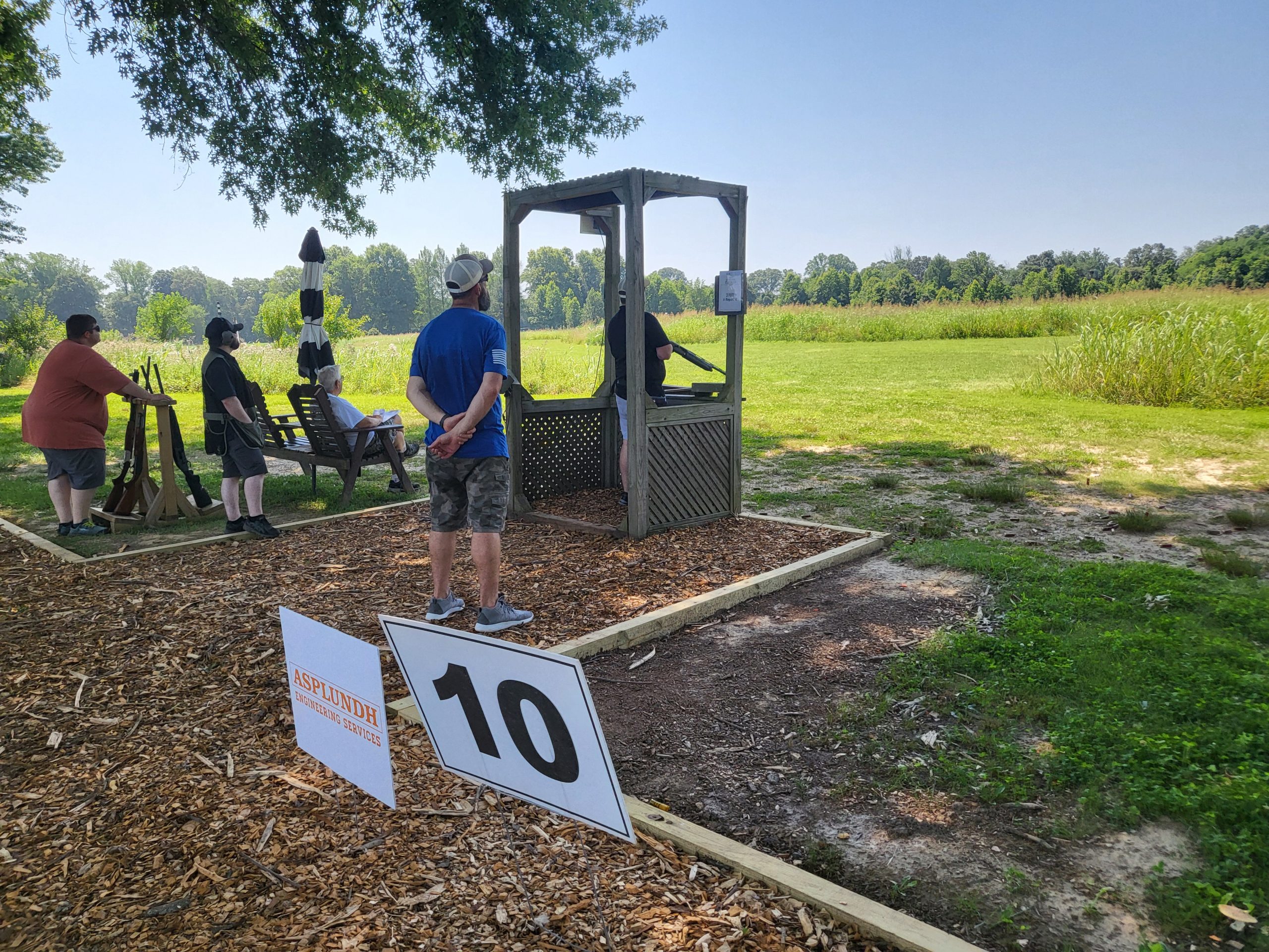 Participants at a sporting clay station